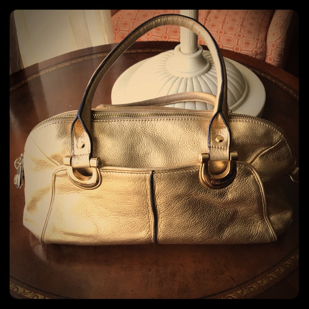 Lovely gold leather B. Makowsky purse.